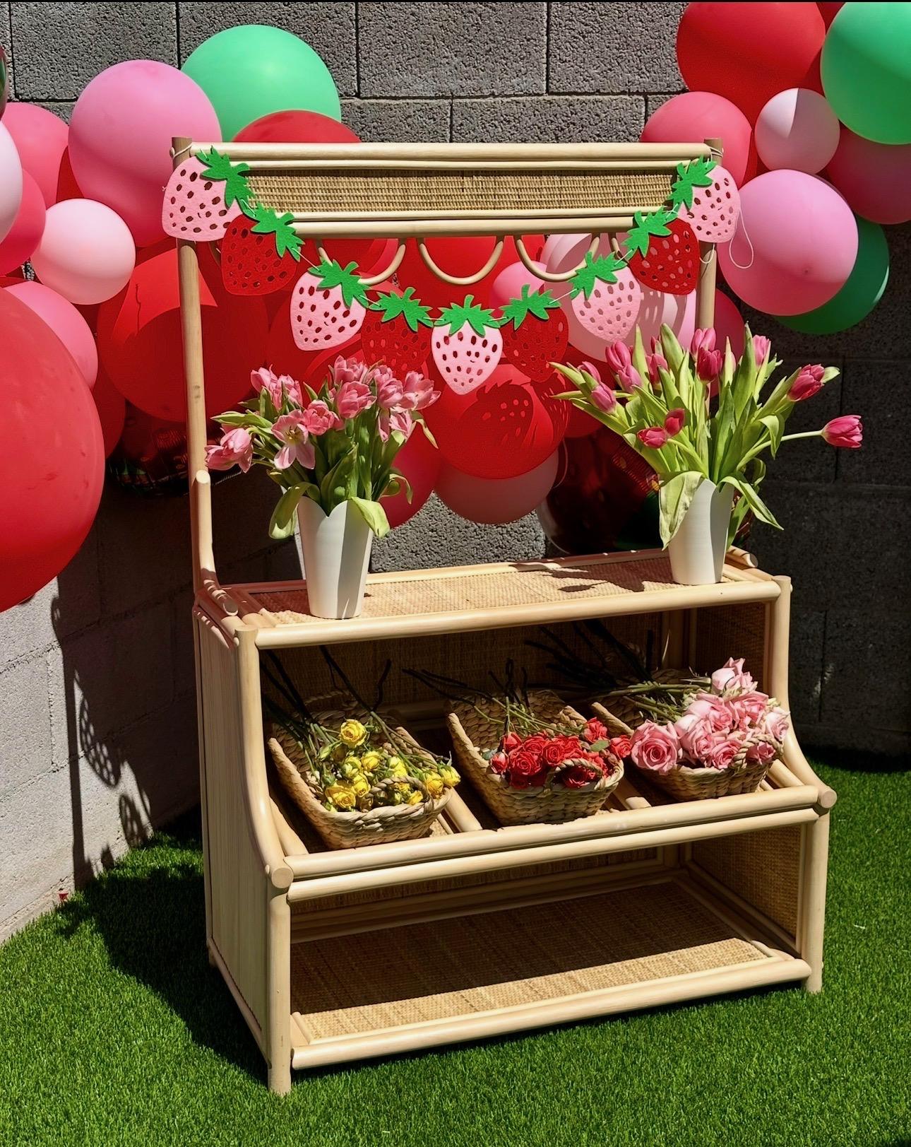 Rattan stand styled as a flower market